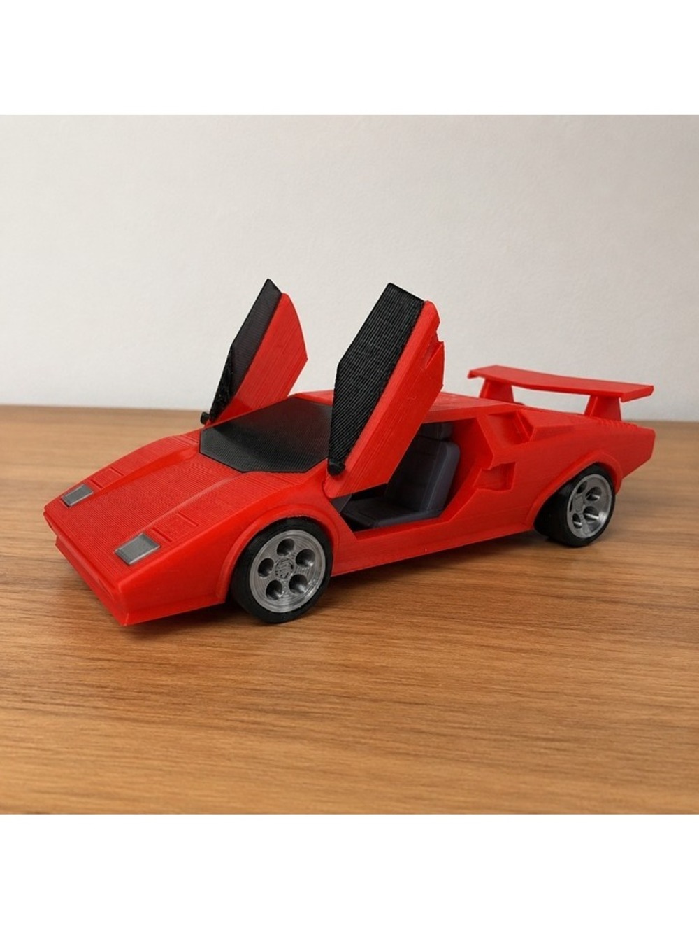 Tiny Red Lamborghini Countach Toy